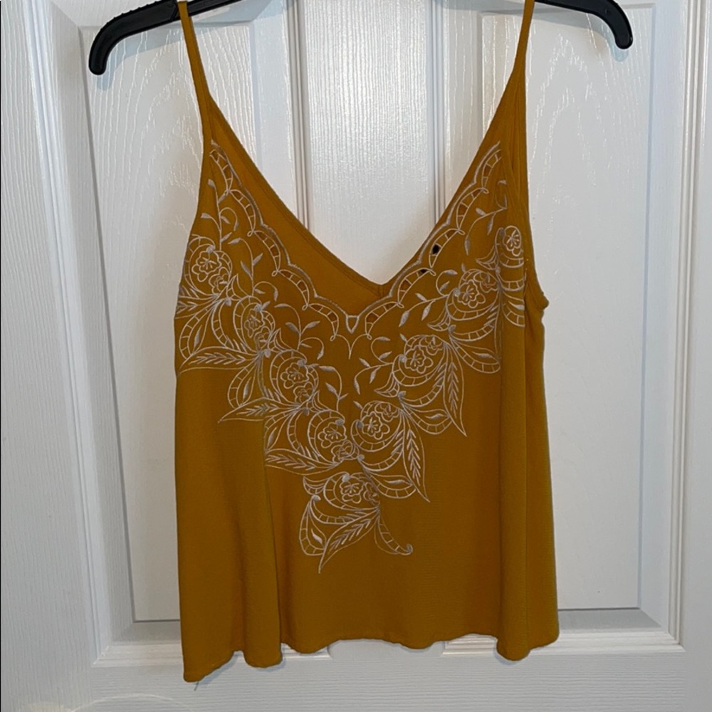 burnt-yellow/orange tank top, loose fitting!